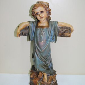Niño en la cruz