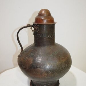 Lechera antigua con tapa