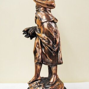 Escultura señora de cobre