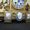 Reloj antiguo y guarnición - Imagen 4