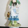 Figura porcelana dama con ánfora