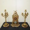 Reloj y guarnición de bronce