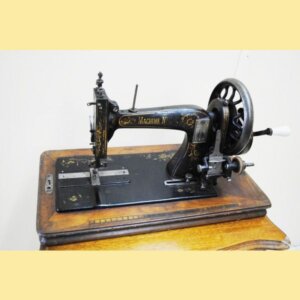 Máquina de coser manivela
