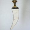 Machete con latón