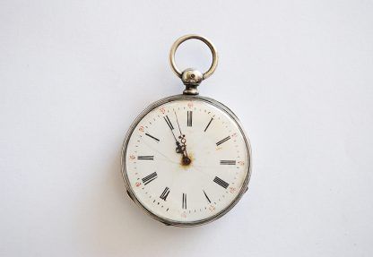 Reloj de bolsillo grabado