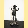 Figura de bronce campesino