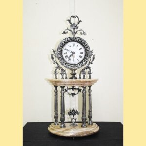 Reloj Isabelino de metal