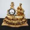 Reloj de bronce y mármol