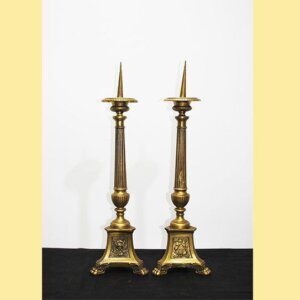 Candelabros hacheros de bronce