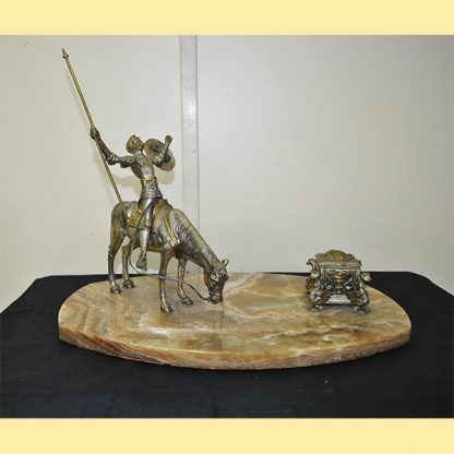 Escribania Quijote de bronce