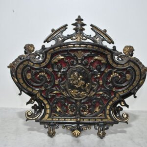Revistero de bronce