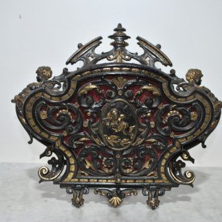 Revistero de bronce
