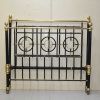 Cama de hierro y bronce