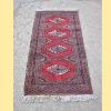 Alfombra persa roja