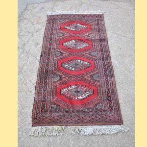 Alfombra persa roja