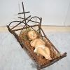 Niño Jesús en cuna