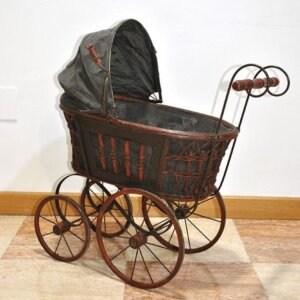 Carro o coche de muñecas