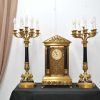 Reloj y candelabros bronce
