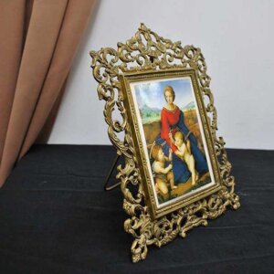 Portafotos de bronce