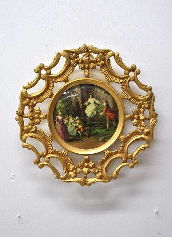 Marco de bronce y porcelana