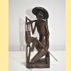 Escultura asiática pescador