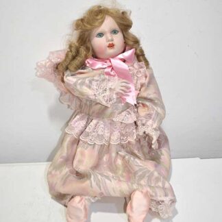 Muñeca porcelana articulada