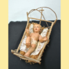 Figura Niño en cuna de madera