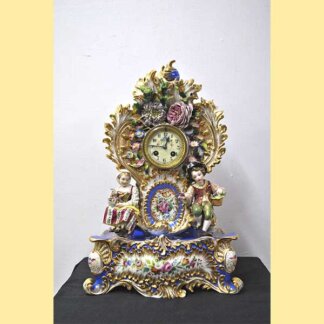 Reloj rococó porcelana
