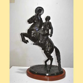 Escultura jinete Cuevas bronce