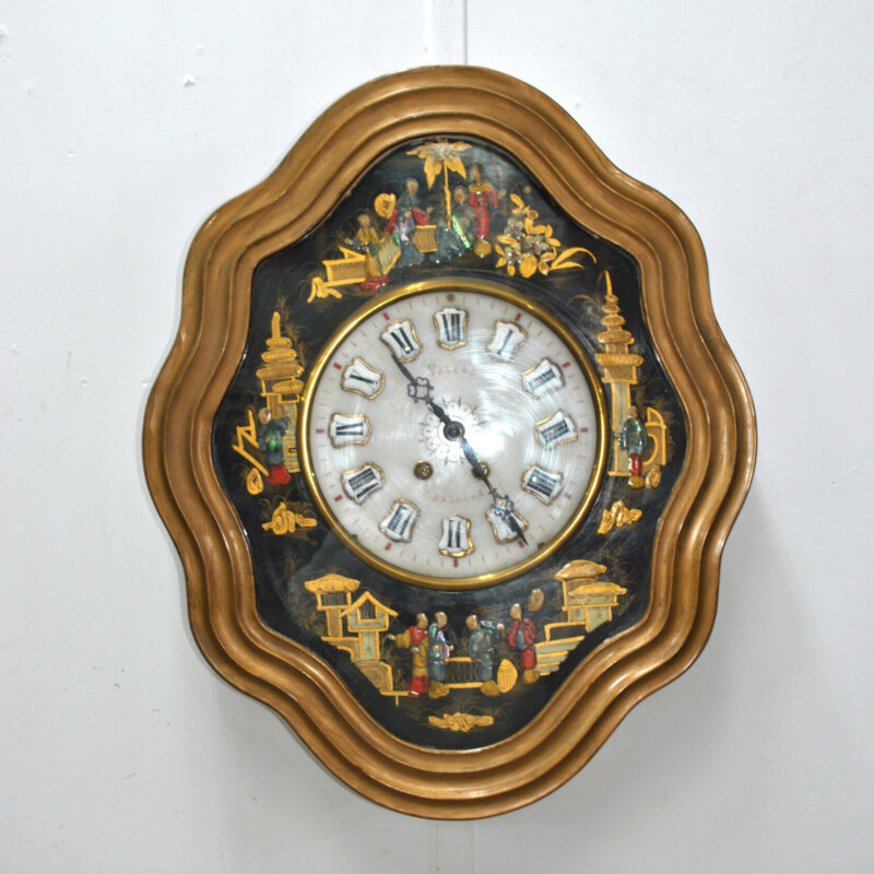 Reloj ojo de buey motivos chinos