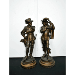 Pareja esculturas calamina