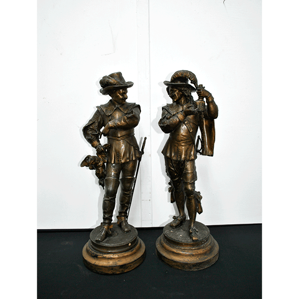 Pareja esculturas calamina