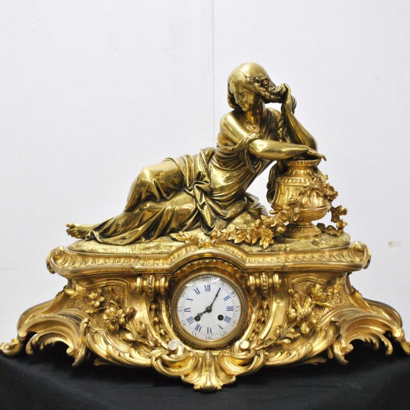 Reloj de bronce al mercurio firma A. Carrier