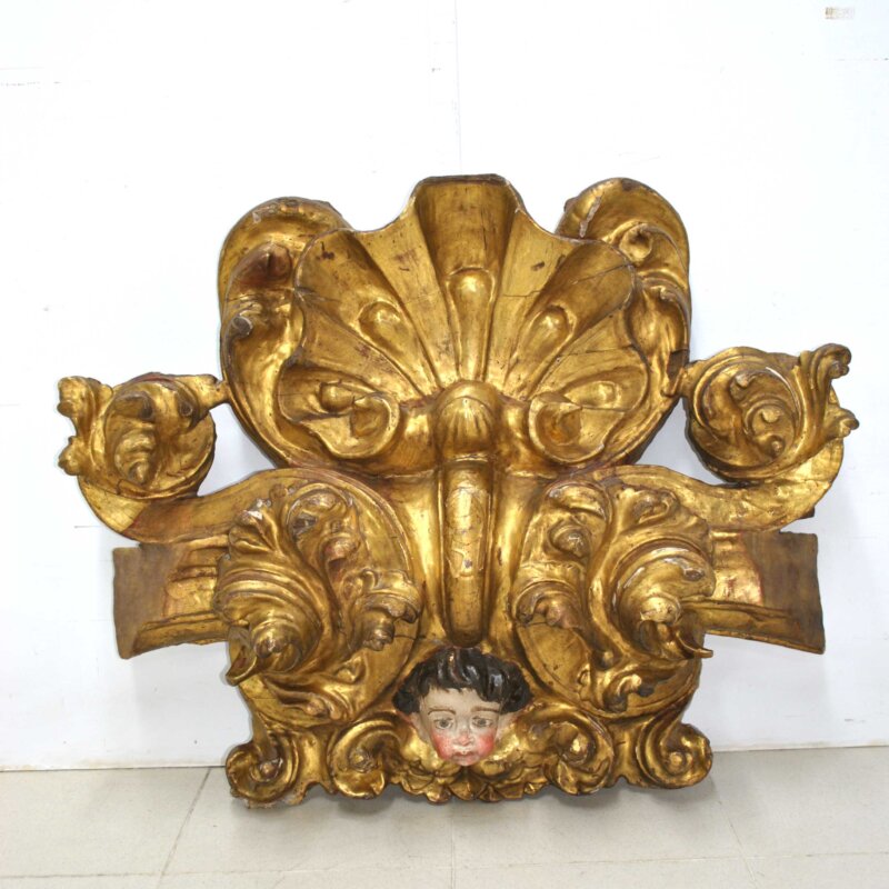 Fragmento tallado angelito querubín