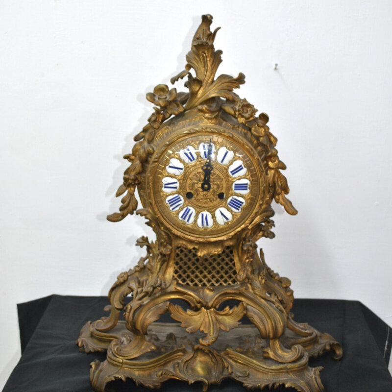 Reloj bronce Luis XV decoración floral