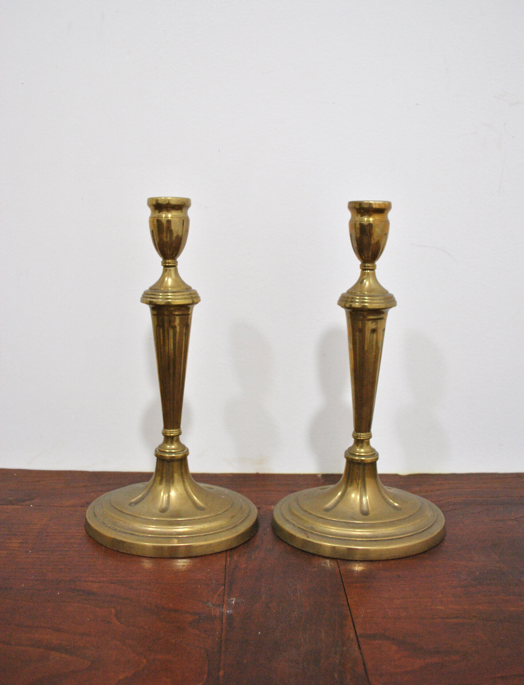 Pareja candelabros bronce 1 vela