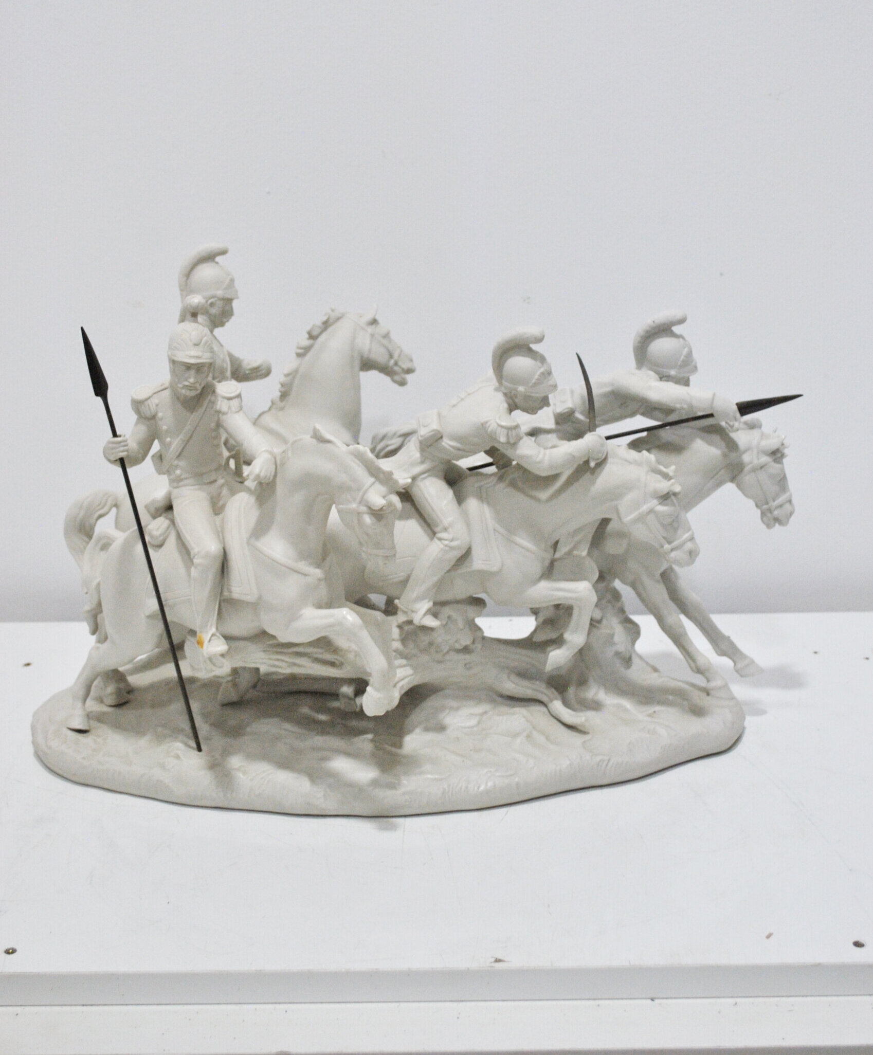 Escultura romanos lanceros con caballos