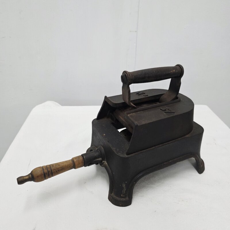 Calentador de planchas de gas antiguo