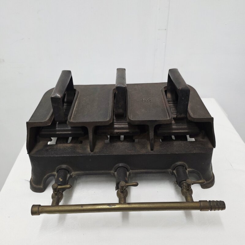 Calentador de planchas antiguo
