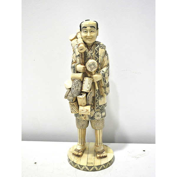 Figura oriental cacharrero de hueso