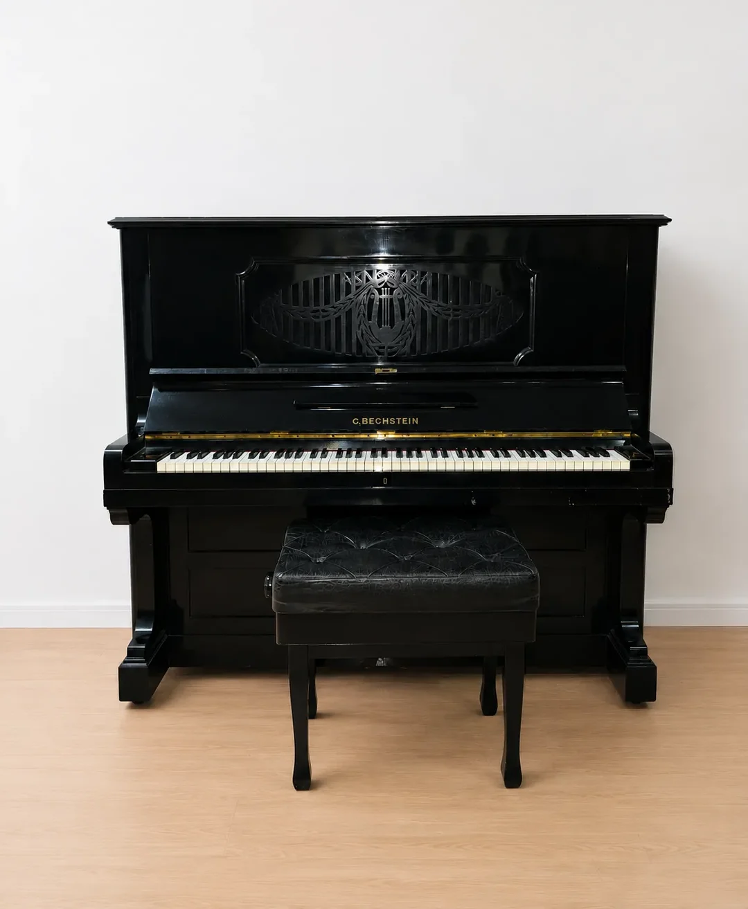 Piano Vertical C. Bechstein Berlín ébano con banqueta