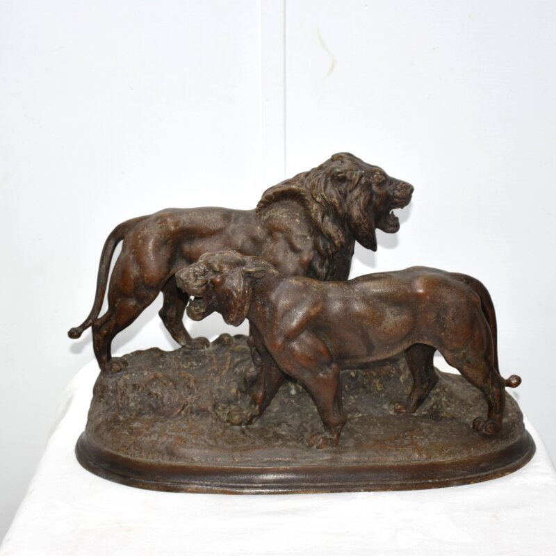 Escultura leones calamina firmada Barye